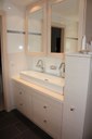 Meuble salle de bain en sapin brossé blanchi